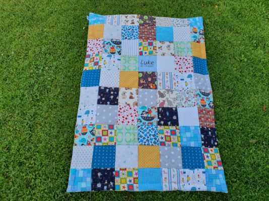 Patchworkdecke mit Name