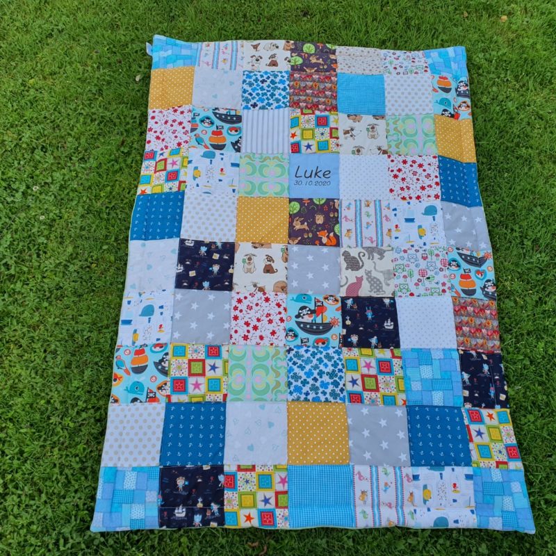 Patchworkdecke mit Name
