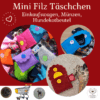 Diese bunten, farbenfrohen Minietuis sind aus hochwertigem weichem und robusten Schurwoll Filz genäht, mit einem Druckknopf zum sicheren Verschließen versehen, haben einen Karabinerhaken mit Wirbelgelenk und bekommen ein passendes buntes Webbändchen.