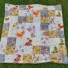 DouDou Patchworkdecke mit Panel mittig zum Pauschalpreis.