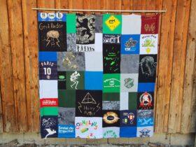 T-Shirtdecke als Patchworkdecke nähen lassen aus geliebten T-Shirts, College Shirts, Souvenir T-Shirts, Band T-Shirts und Sporttrikots.
