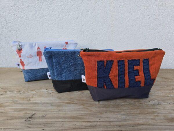 Upcycling - Täschchen, Kosmetiktäschchen und Kulturbeutel genäht aus Kleidung, wie Jeans, T-Shirts.