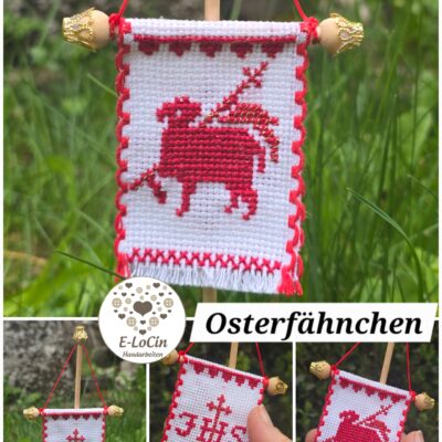 Handgesticktes Osterfähnchen mit IHS und Osterlamm. Doppelseitig bestickt, mit feinen Goldakzenten. Traditionelle, ruhige Handarbeit – ideal für Osterlammkuchen und Osterdeko.